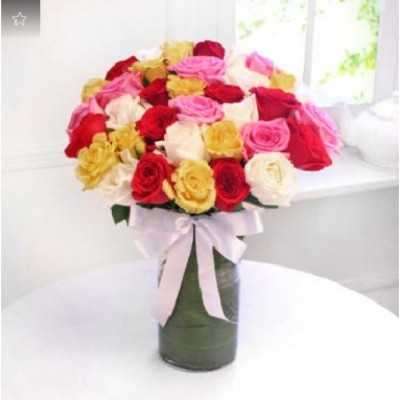 Arrangement Of 35 Roses In A Glass Vase Profile Picture